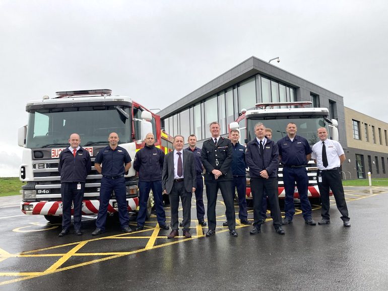 Cleveland Fire Brigade’s Chief Fire Officer Ian Hayton and Chair of the Cleveland Fire Authority Cllr Paul Kirton alongside Cleveland fire crew and the two donated fire engines. (Cleveland Fire Brigade)